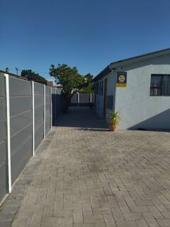Secure courtyard 60 on Kosmos guesthouse Bellville South - safe parking and CCTV security for contractor accommodation Cape Town